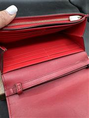 CHRISTIAN LOUBOUTIN POCHETTE WRISTLET